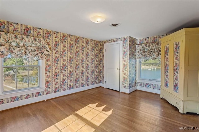 unfurnished bedroom featuring wood-type flooring