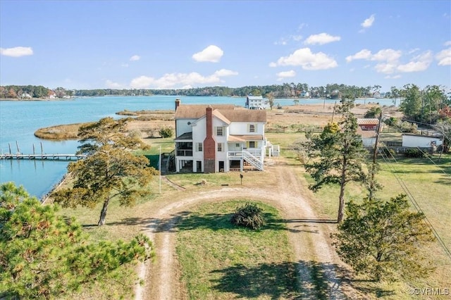 drone / aerial view featuring a water view