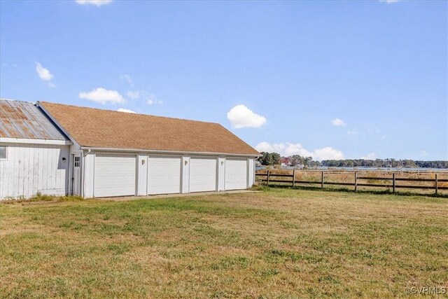 view of yard with a rural view