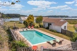 view of swimming pool with a fenced in pool, fence, and a patio area