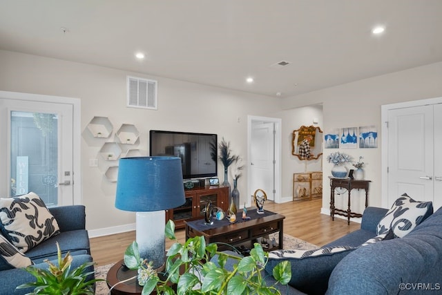 living room featuring light hardwood / wood-style floors