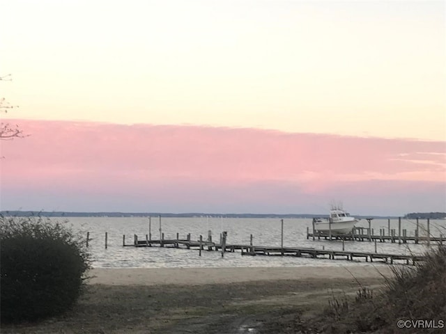 view of dock with a water view