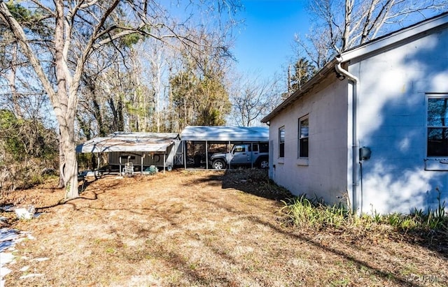 view of yard with a carport