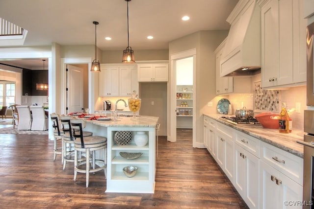 1509 Buford Rd, North Chesterfield, VA 23235 - kitchen with premium range hood, stainless steel gas stovetop, white cabinets, decorative backsplash, and recessed lighting