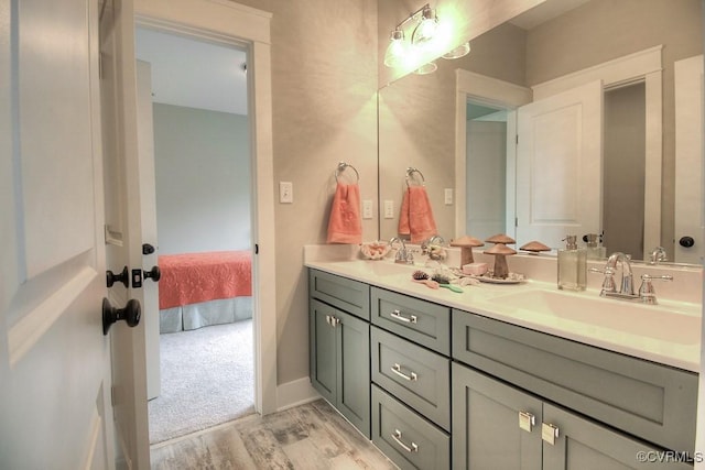 1509 Buford Rd, North Chesterfield, VA 23235 - ensuite bathroom with double vanity and wood finished floors