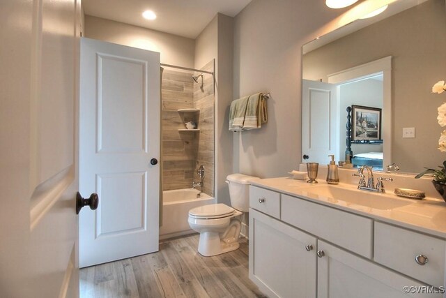 1509 Buford Rd, North Chesterfield, VA 23235 - bathroom with wood finished floors, vanity, toilet, shower / bathtub combination, and recessed lighting