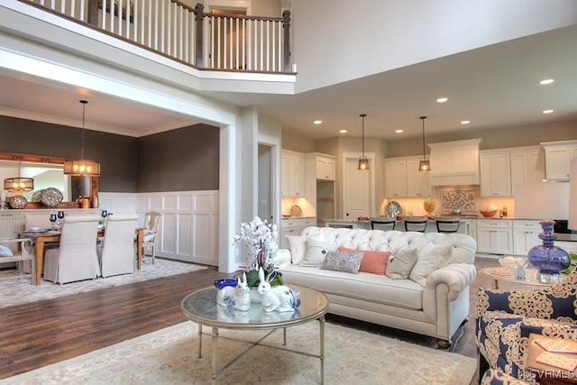 1509 Buford Rd, North Chesterfield, VA 23235 - living area featuring dark wood-style floors, recessed lighting, a wainscoted wall, a towering ceiling, and crown molding