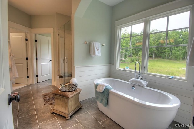 1509 Buford Rd, North Chesterfield, VA 23235 - bathroom with a soaking tub, a shower stall, tile patterned flooring, and a wainscoted wall
