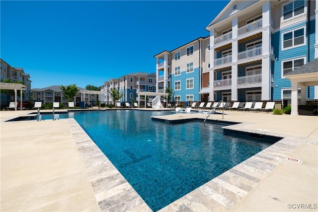 view of swimming pool featuring a patio