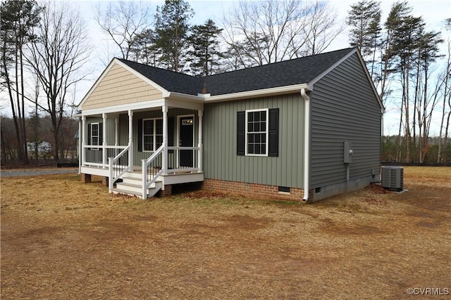 view of front of home with central air condition unit and covered porch