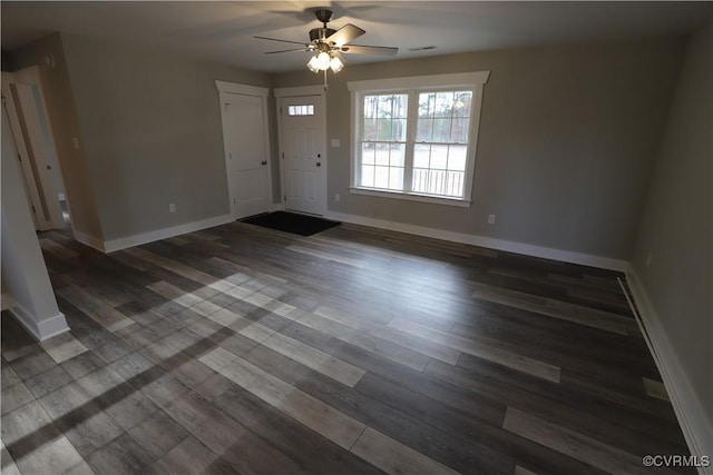 foyer featuring dark hardwood / wood-style floors and ceiling fan