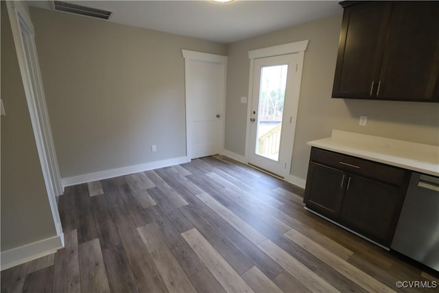 unfurnished dining area featuring hardwood / wood-style floors