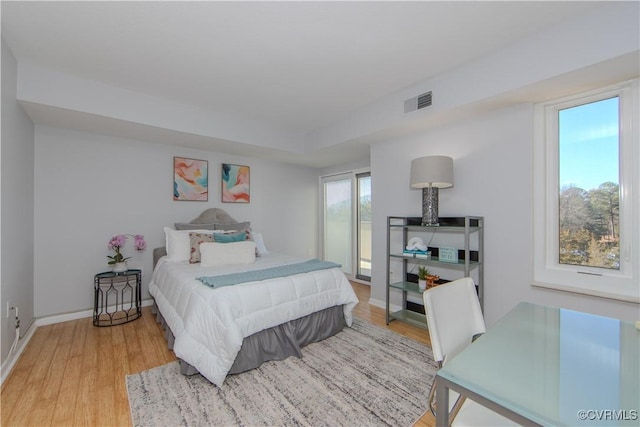 bedroom with light hardwood / wood-style floors