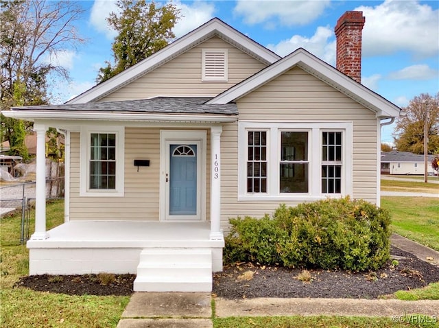 bungalow-style house featuring covered porch