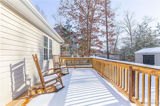 view of snow covered deck