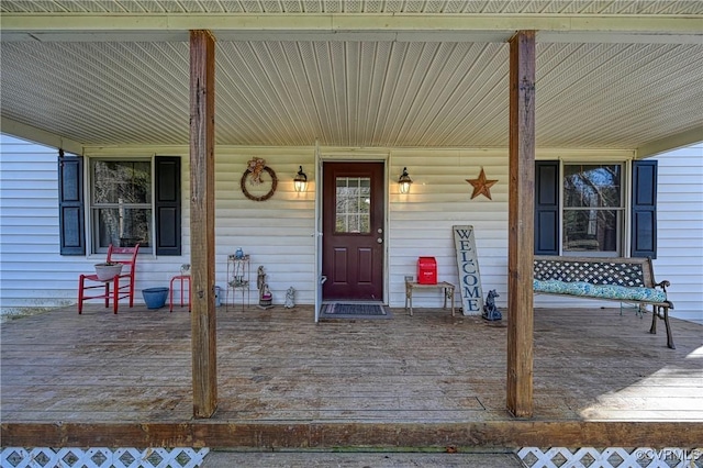 entrance to property with covered porch