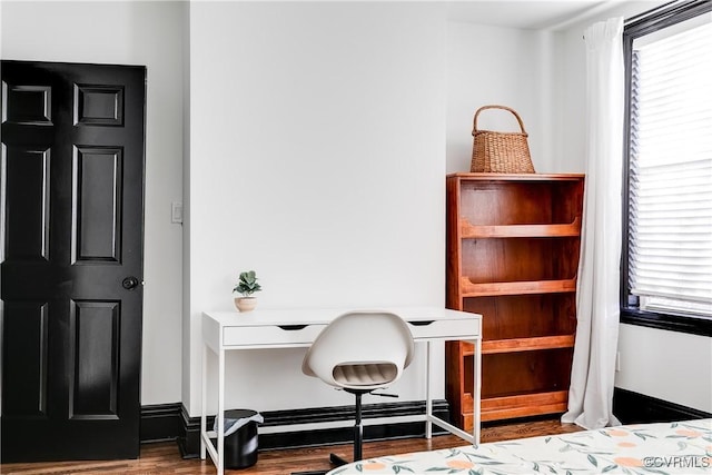 office area with wood-type flooring