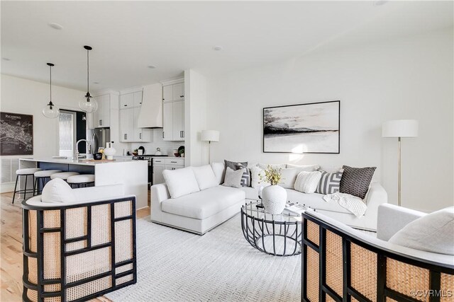 living room with light hardwood / wood-style floors