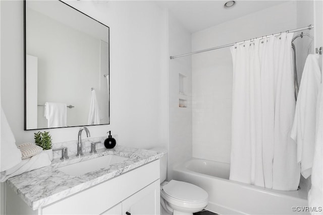 full bathroom featuring vanity, toilet, and shower / bath combo