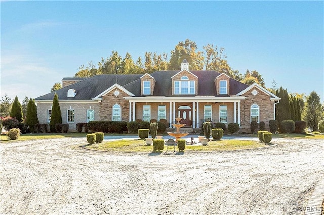 cape cod house with covered porch