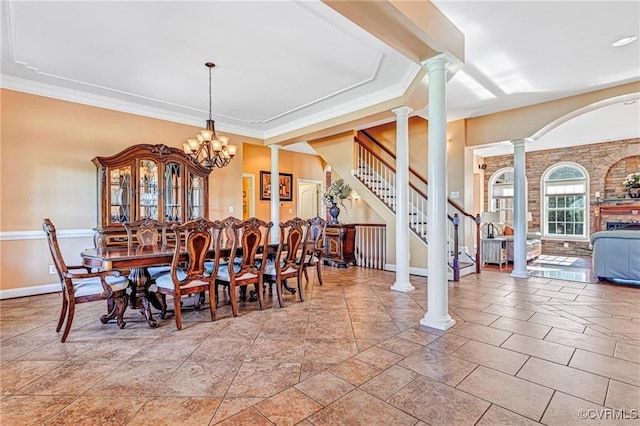 dining room featuring an inviting chandelier and ornamental molding