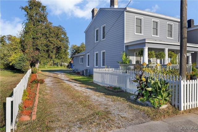 view of home's exterior with central AC