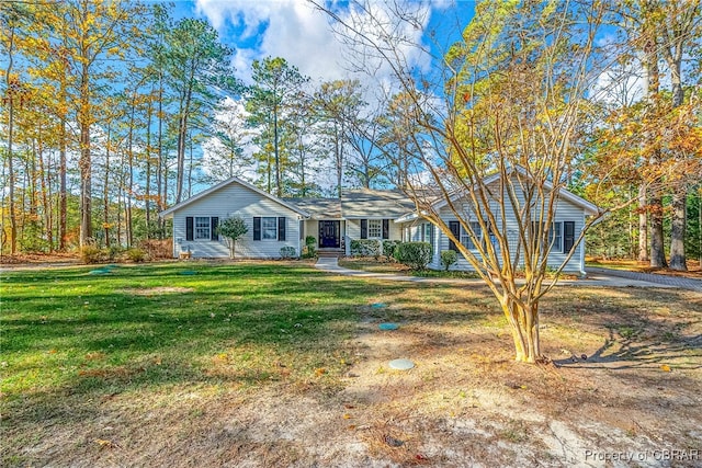 ranch-style house with a front yard