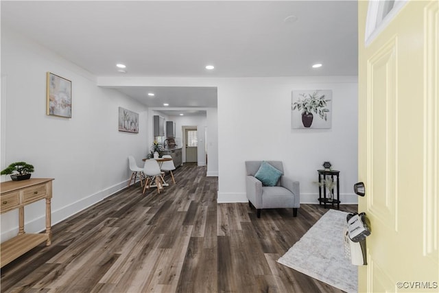 sitting room featuring dark hardwood / wood-style floors