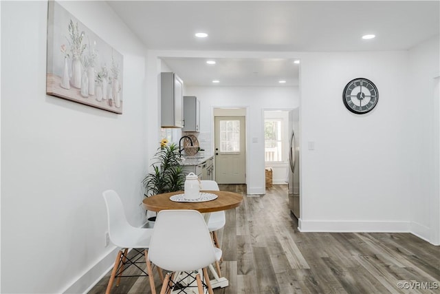 dining space featuring light hardwood / wood-style flooring