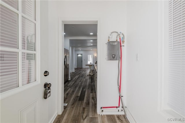 hallway featuring dark hardwood / wood-style flooring