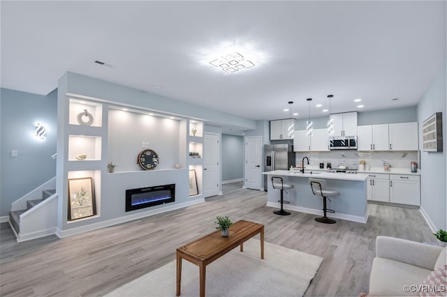 living room with light wood-type flooring