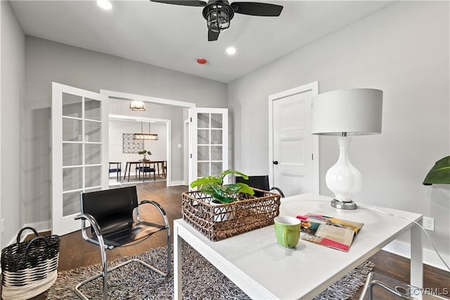 office space featuring french doors, dark hardwood / wood-style floors, and ceiling fan