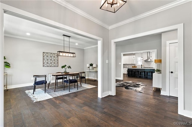 dining room featuring dark hardwood / wood-style floors and ornamental molding