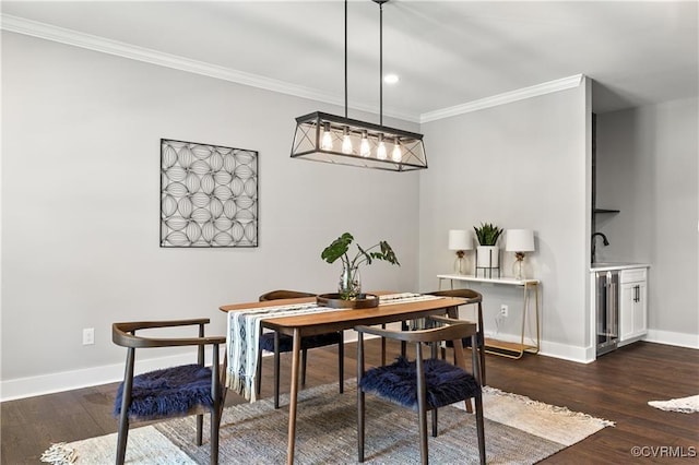 dining room featuring crown molding and dark hardwood / wood-style flooring