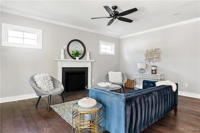 living room with ceiling fan, dark wood-type flooring, and ornamental molding