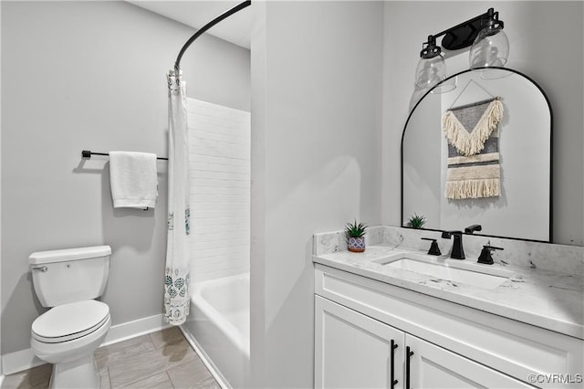 full bathroom featuring shower / bath combination with curtain, toilet, and vanity