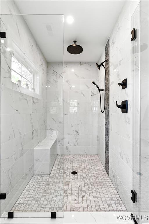 bathroom with an enclosed shower