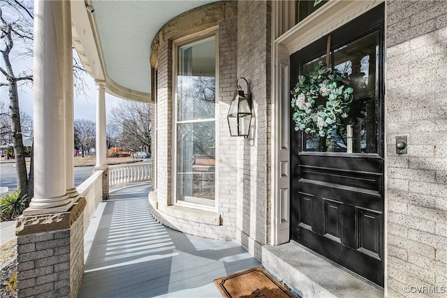 2002 Princess Anne Ave, Richmond, VA 23223 - property entrance with covered porch and brick siding