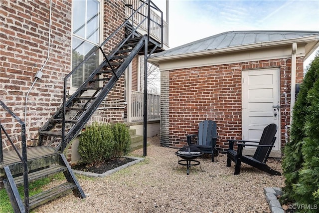 exterior space featuring a fire pit