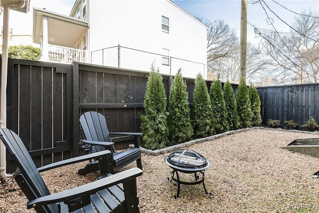 view of patio featuring a fire pit