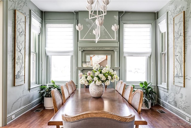 2002 Princess Anne Ave, Richmond, VA 23223 - dining room featuring a chandelier, healthy amount of natural light, and wood finished floors