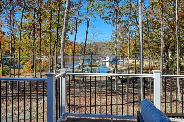 view of gate featuring a water view