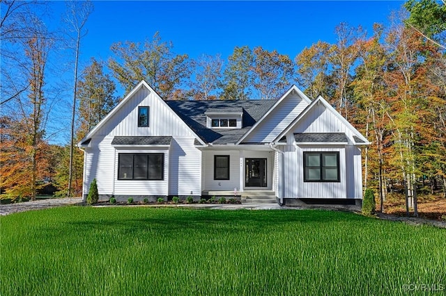 modern farmhouse featuring a front lawn