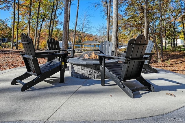 view of patio featuring an outdoor fire pit