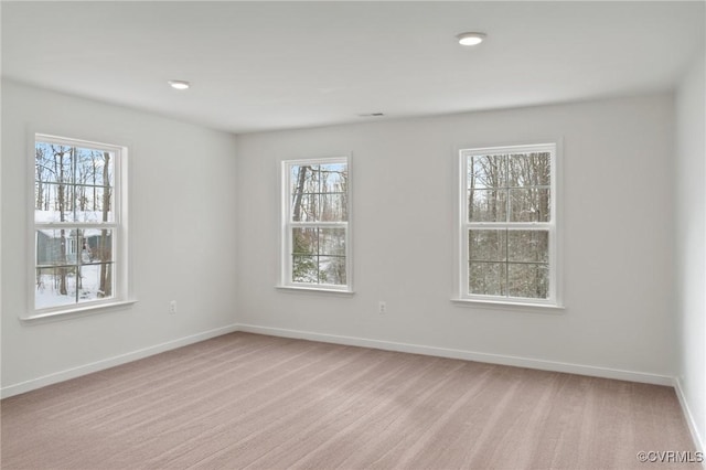 view of carpeted spare room