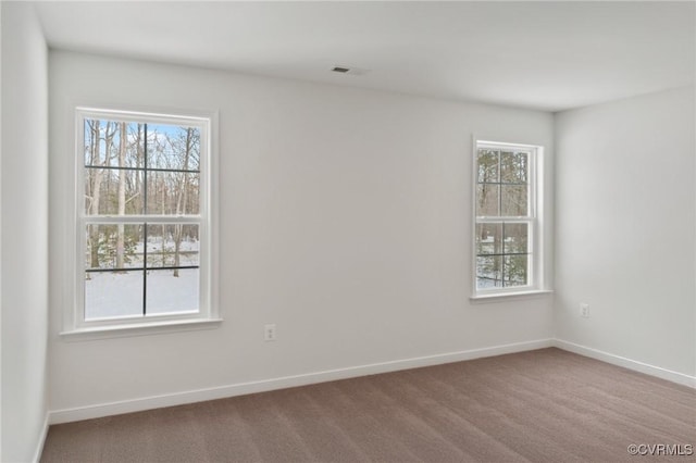 view of carpeted spare room