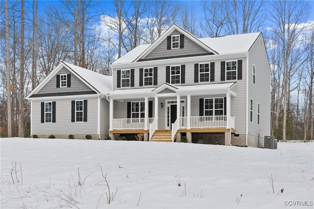 view of front of house with central AC unit and a porch