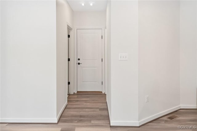 hall featuring light hardwood / wood-style floors