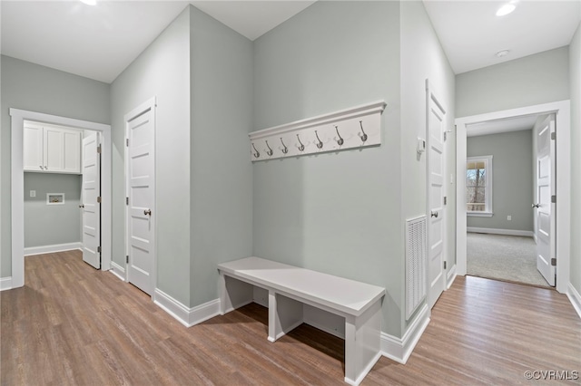 mudroom with light wood-type flooring