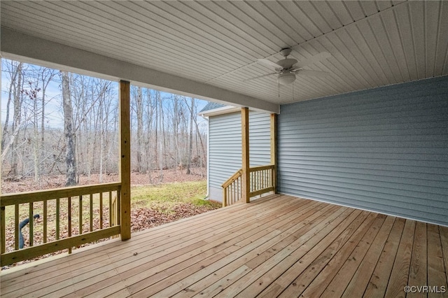 wooden deck with ceiling fan